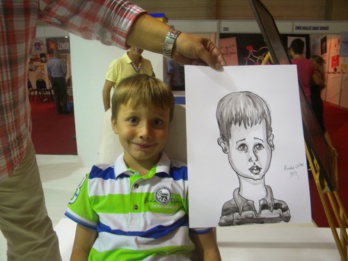 Cartoon: live portrait drawings (medium) by menekse cam tagged cizimleri,portre,canli,fuar,enternasyonal,municipality,buca,drawing,portrait,live,fair,international,izmir